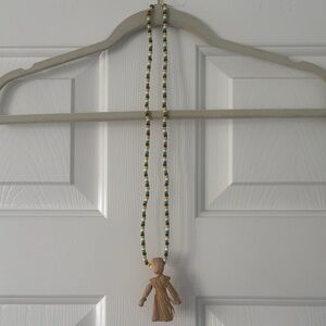 Handcrafted Beaded Necklace with Corn Husk Doll Pendant